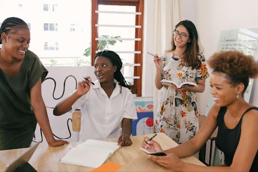 Employees collaborating in a workplace that prioritizes their mental health in Alameda, CA.